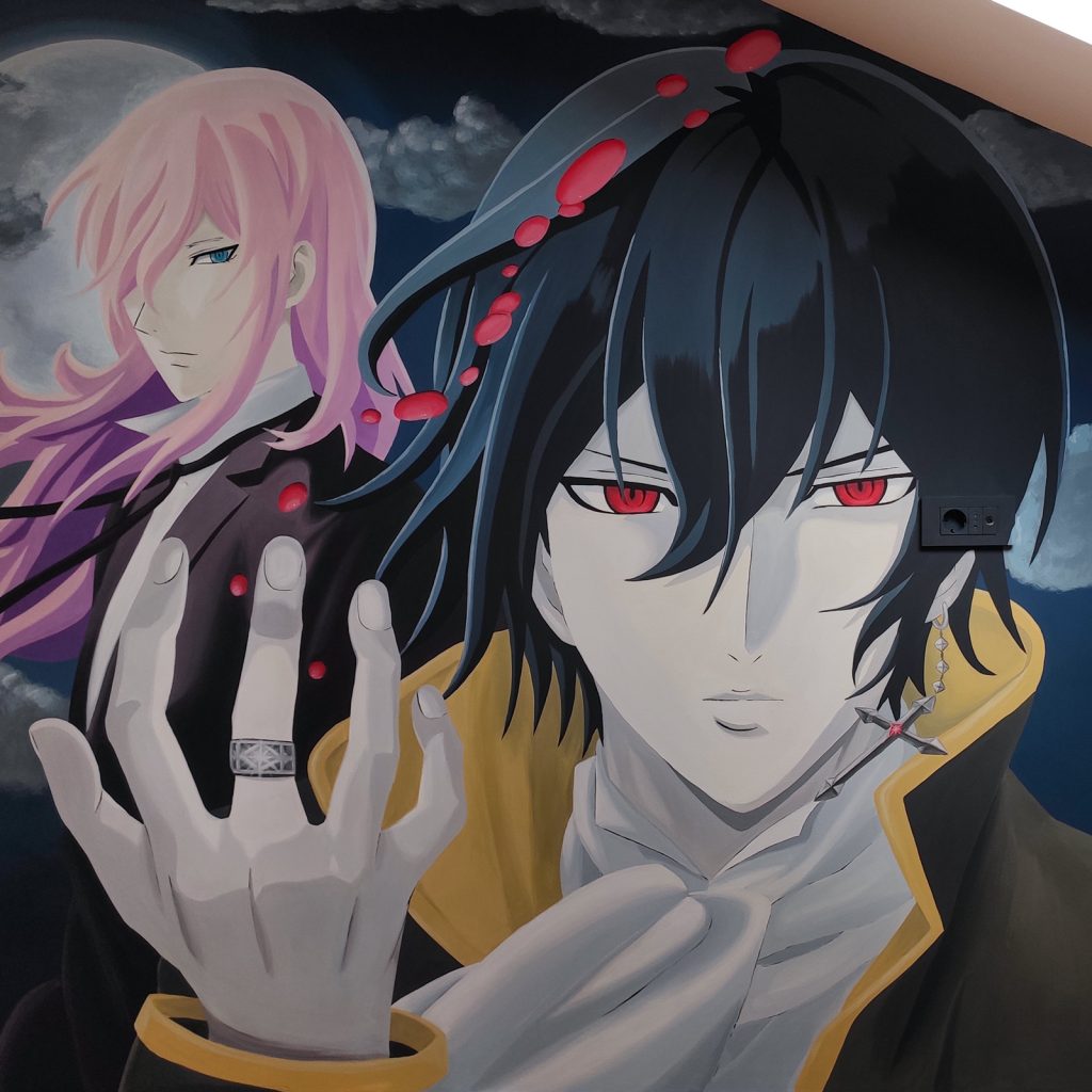 Detalj ručno oslikanog anime lika na muralu
